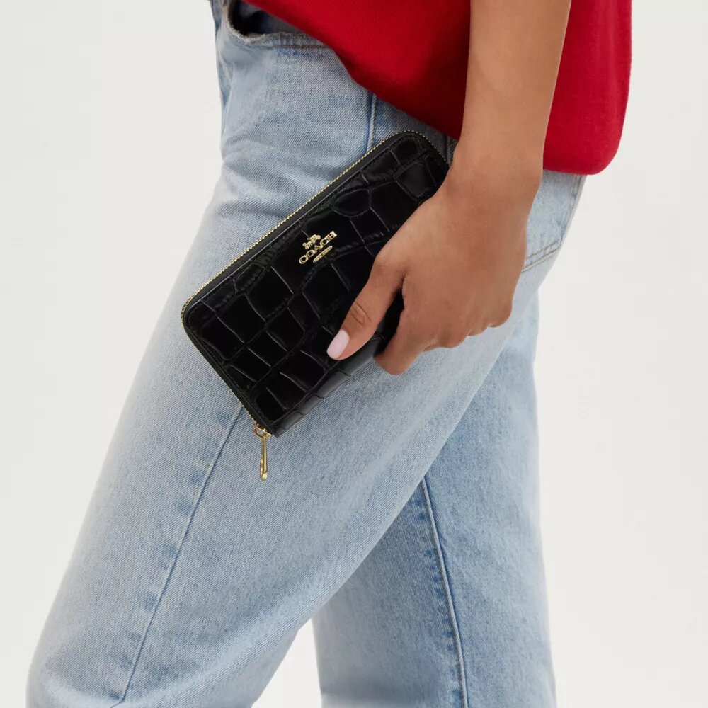 Cartera larga con cremallera envolvente