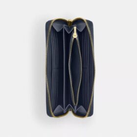 Cartera larga con cremallera envolvente en denim exclusivo