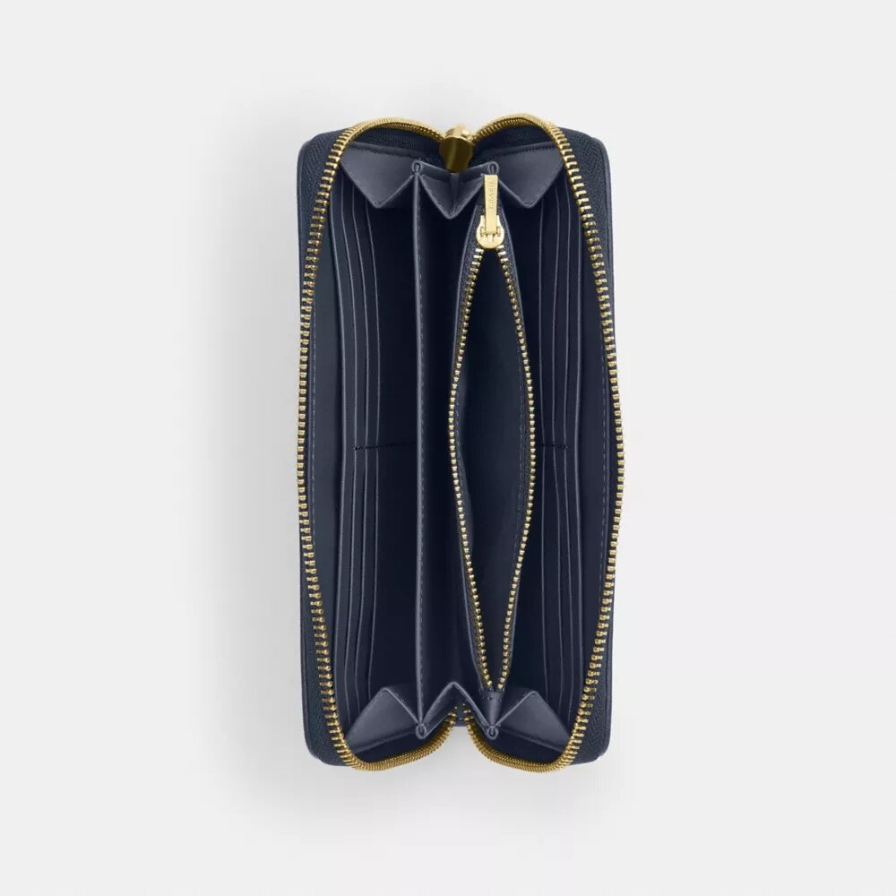 Cartera larga con cremallera envolvente en denim exclusivo