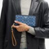 Cartera larga con cremallera envolvente en denim exclusivo