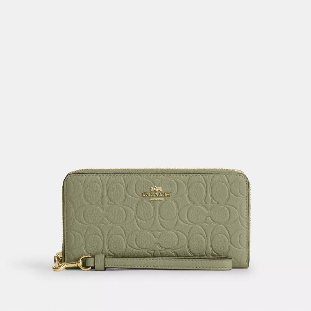 Cartera larga con cremallera envolvente en piel exclusiva