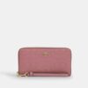 Cartera larga con cremallera envolvente en piel exclusiva