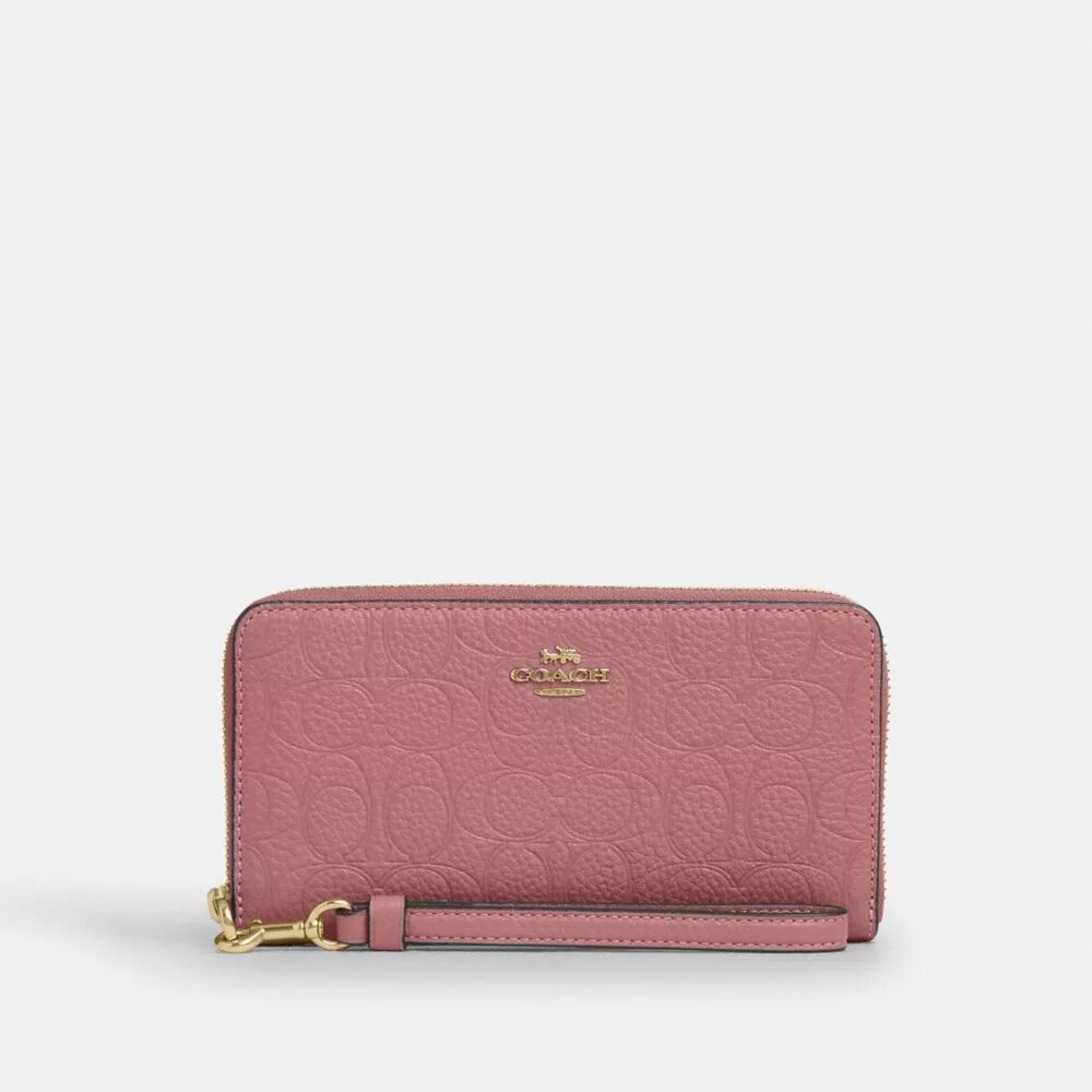 Cartera larga con cremallera envolvente en piel exclusiva