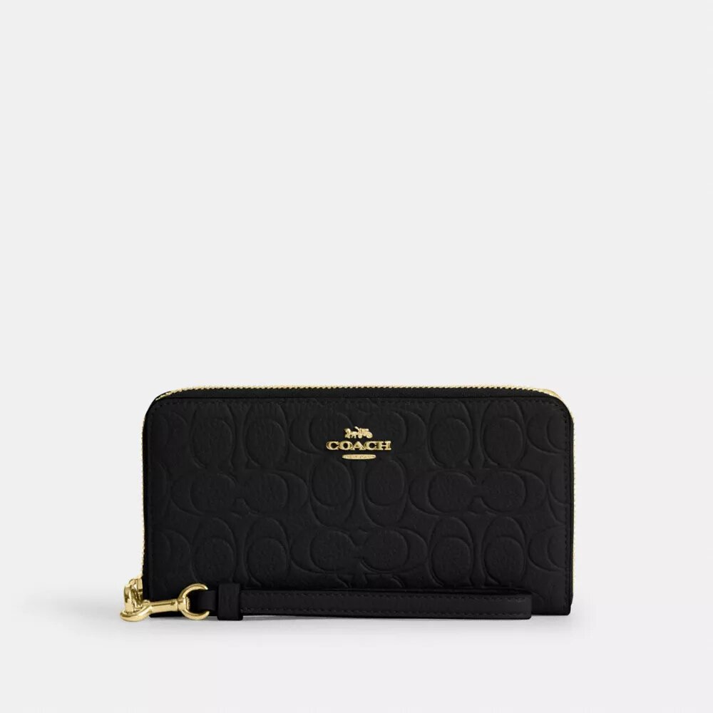 Cartera larga con cremallera envolvente en piel exclusiva