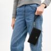 Cartera larga con cremallera envolvente en piel exclusiva