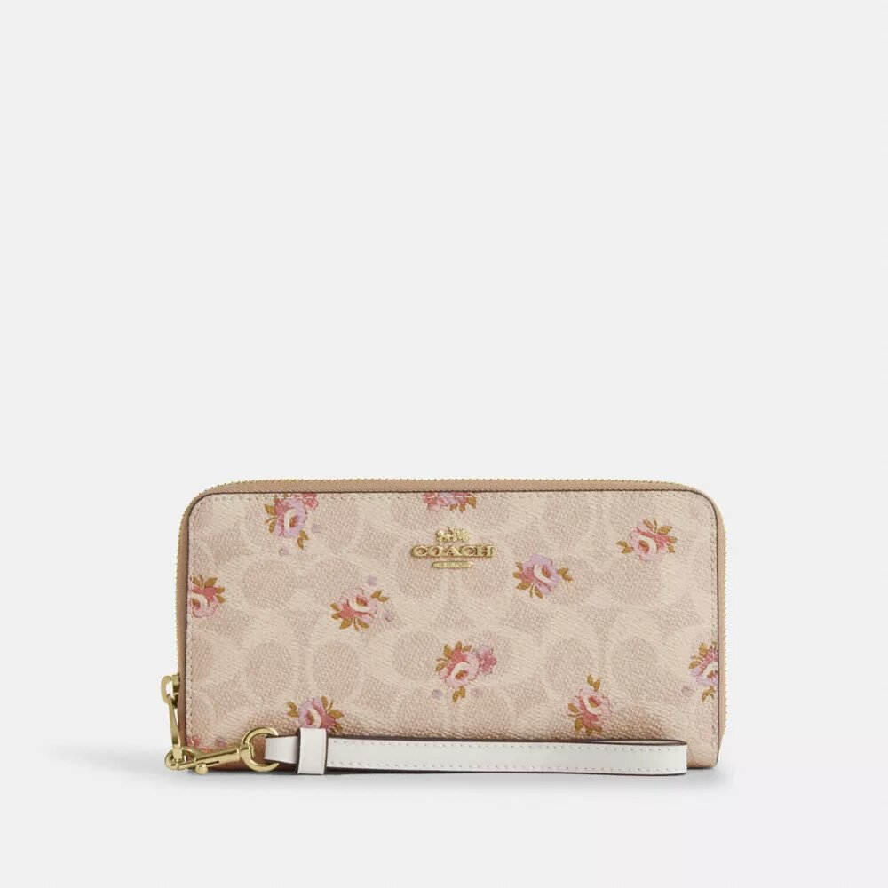 Cartera larga con cremallera envolvente en Signature Canvas con estampado floral