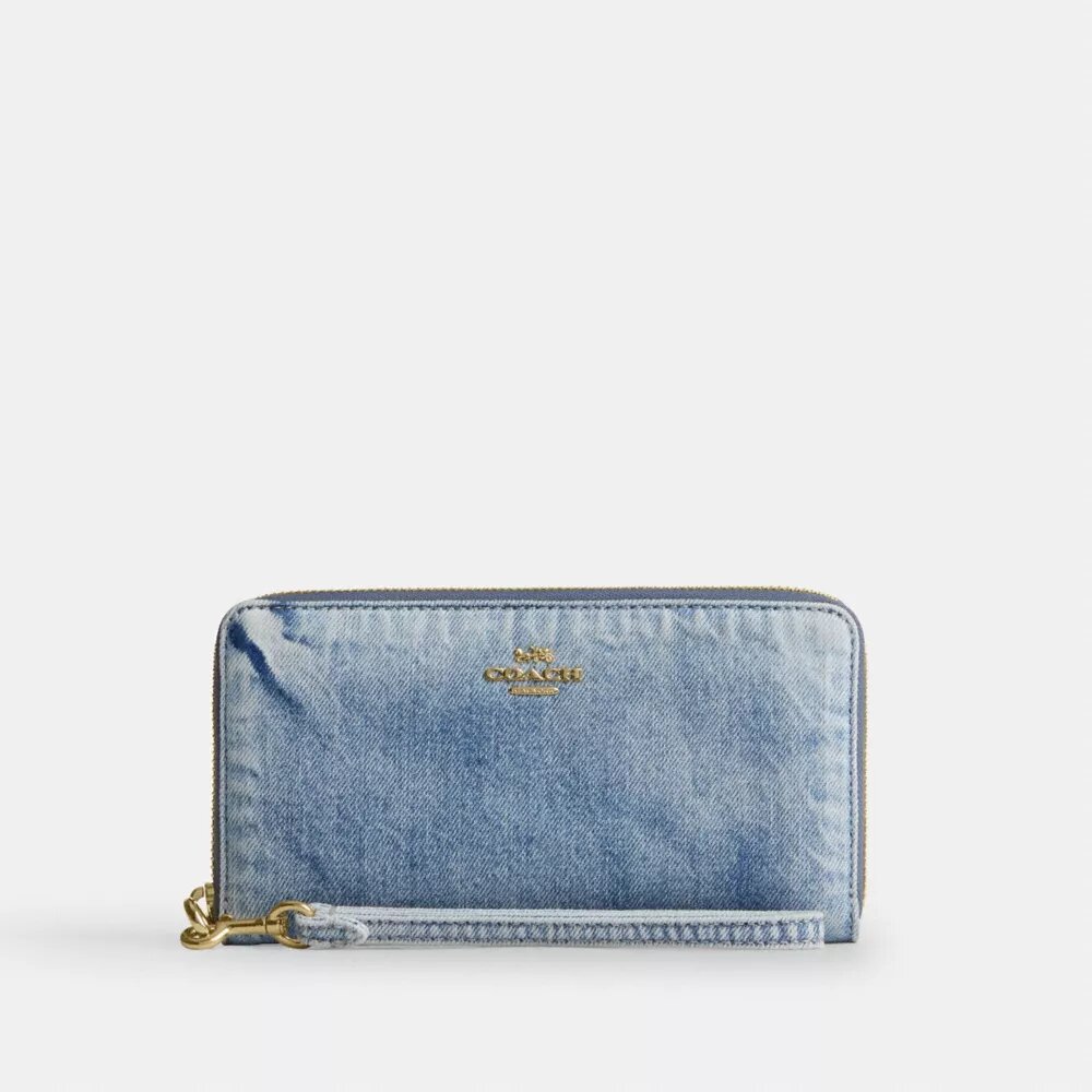 Cartera larga con cremallera perimetral en denim desgastado