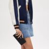 Cartera larga con cremallera perimetral en jacquard exclusivo