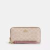 Cartera larga con cremallera perimetral en Signature Canvas