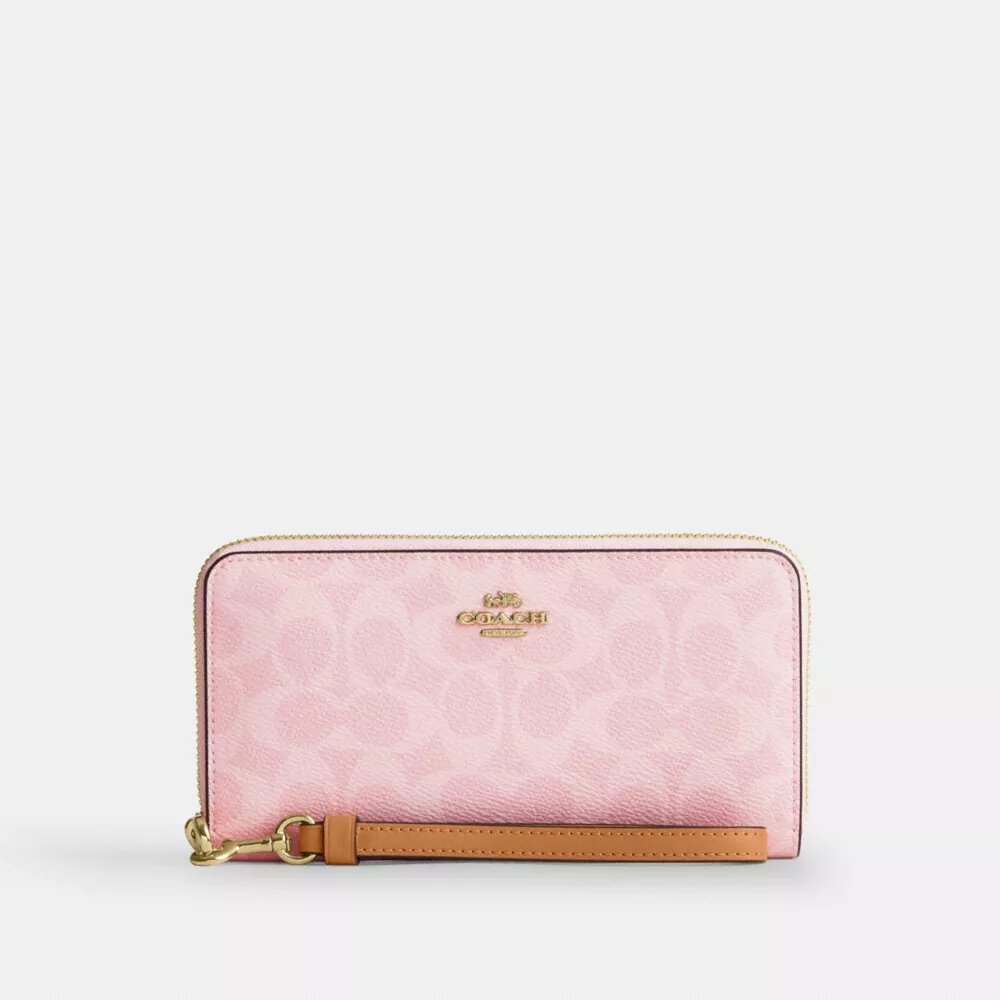 Cartera larga con cremallera perimetral en Signature Canvas