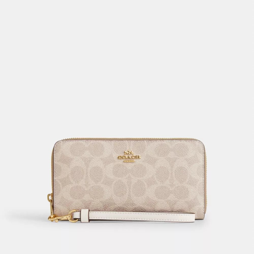 Cartera larga con cremallera perimetral en Signature Canvas