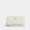 Cartera larga con cremallera perimetral en Signature Canvas