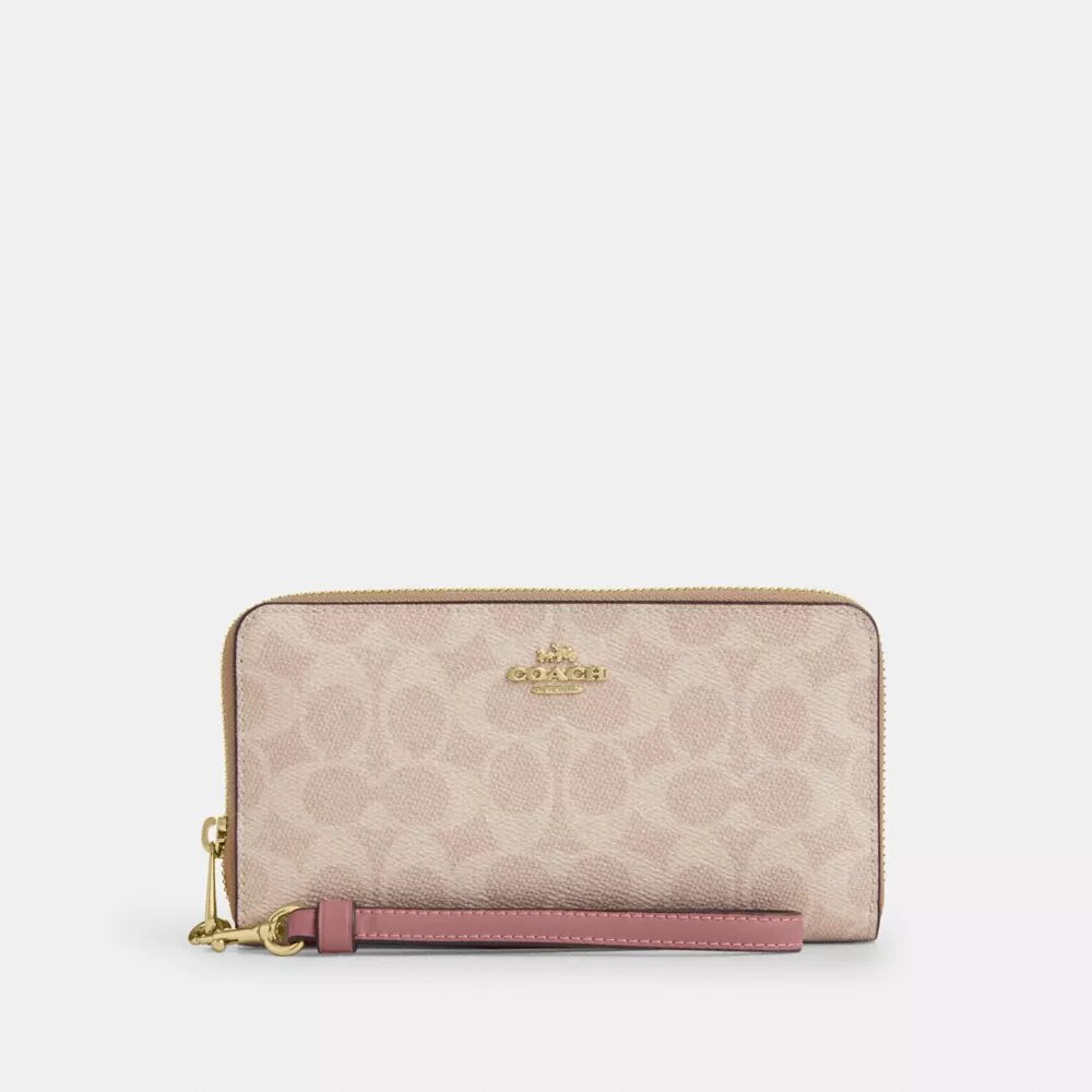 Cartera larga con cremallera perimetral en Signature Canvas