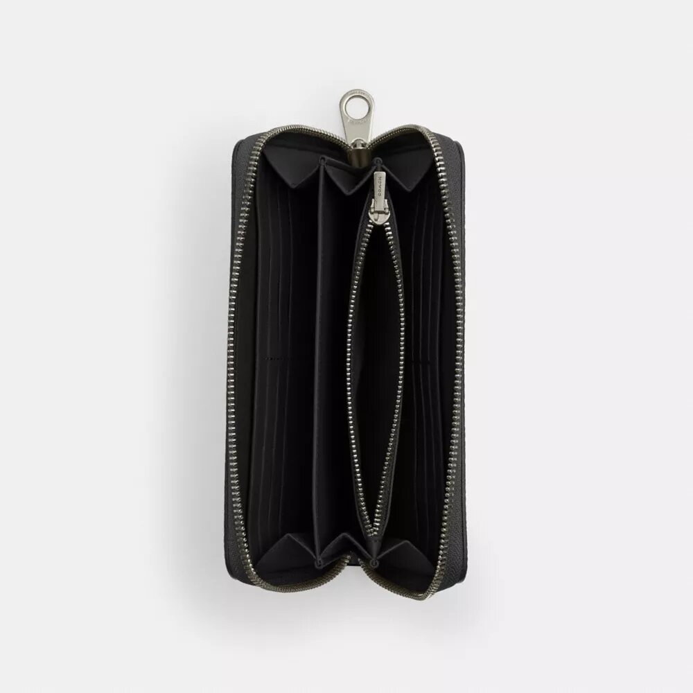 Cartera larga con cremallera perimetral en Signature Canvas