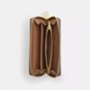 Cartera larga con cremallera perimetral en Signature Canvas