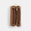 Cartera larga con cremallera perimetral en Signature Canvas