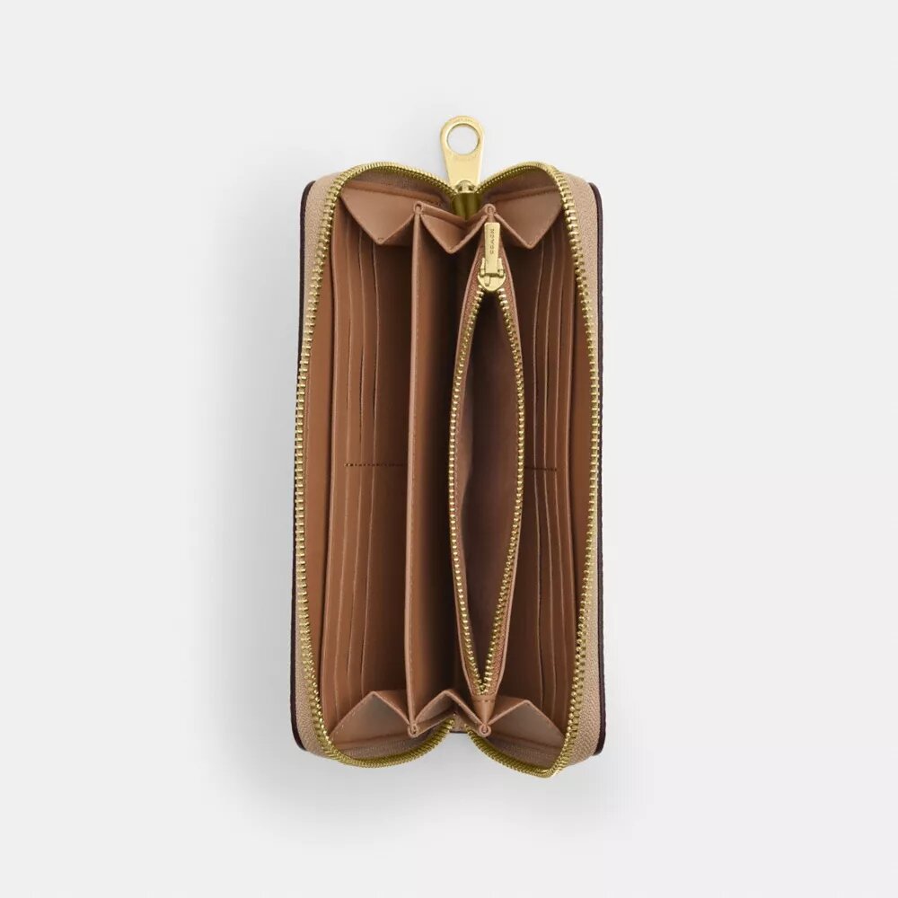 Cartera larga con cremallera perimetral en Signature Canvas