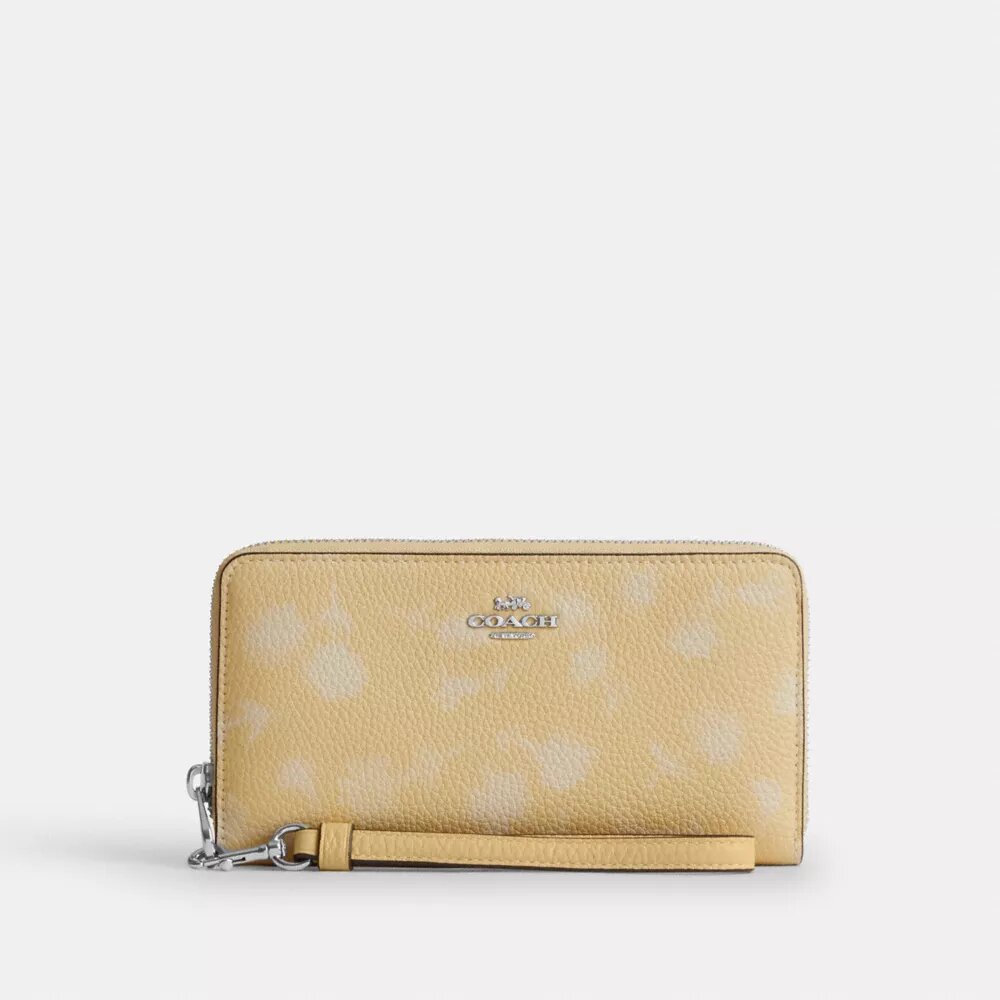 Cartera larga con cremallera perimetral y estampado floral