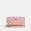 Cartera larga con cremallera perimetral y estampado floral