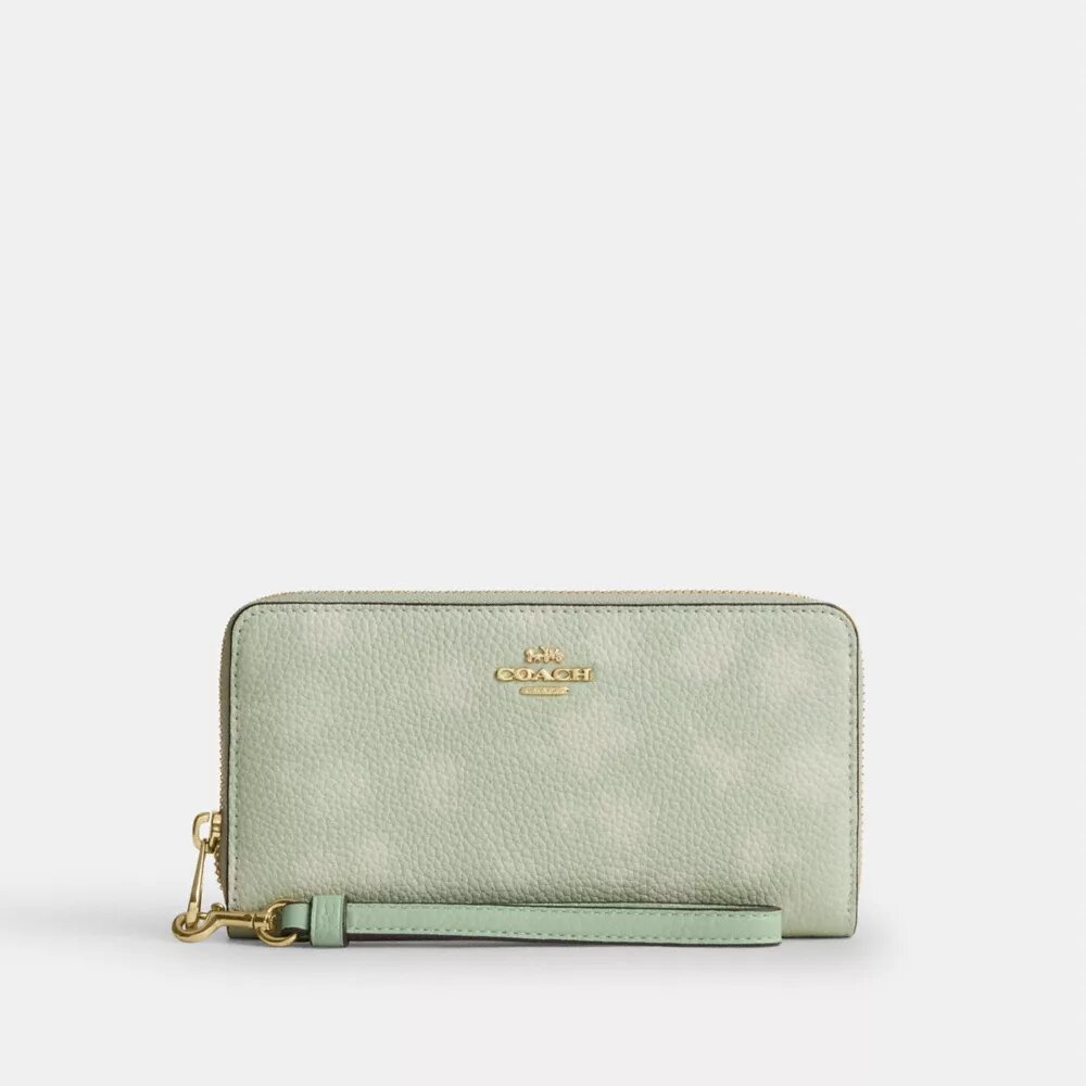 Cartera larga con cremallera perimetral y estampado floral