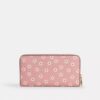 Cartera larga con cremallera perimetral y estampado floral