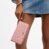 Cartera larga con cremallera perimetral y estampado floral