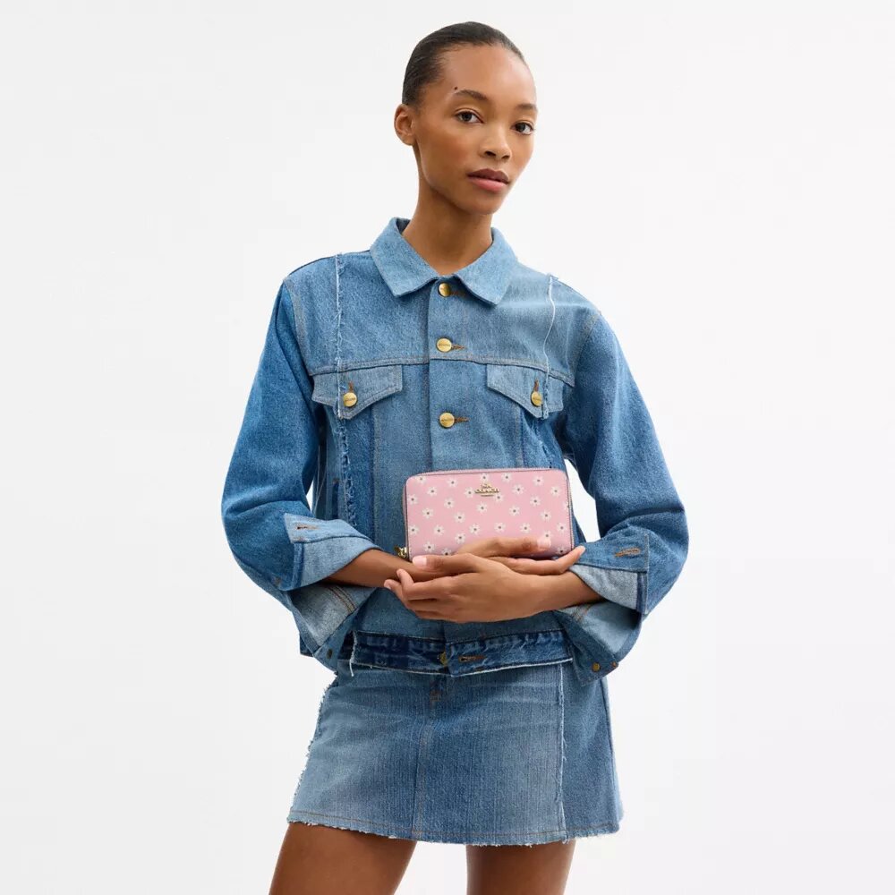 Cartera larga con cremallera perimetral y estampado floral
