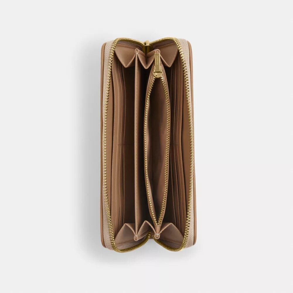 Cartera larga con cremallera perimetral y Signature Canvas