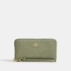 Cartera larga con cremallera y acolchado
