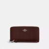 Cartera larga con cremallera y acolchado