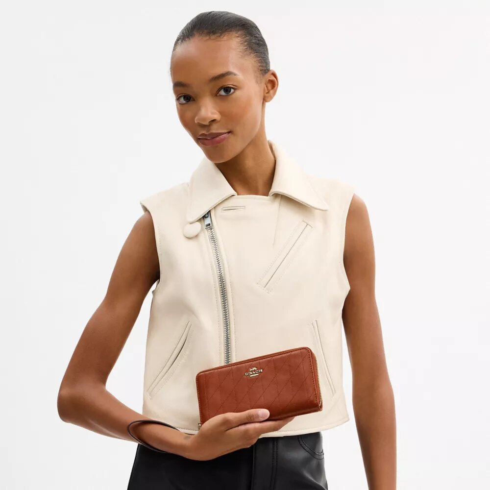 Cartera larga con cremallera y acolchado