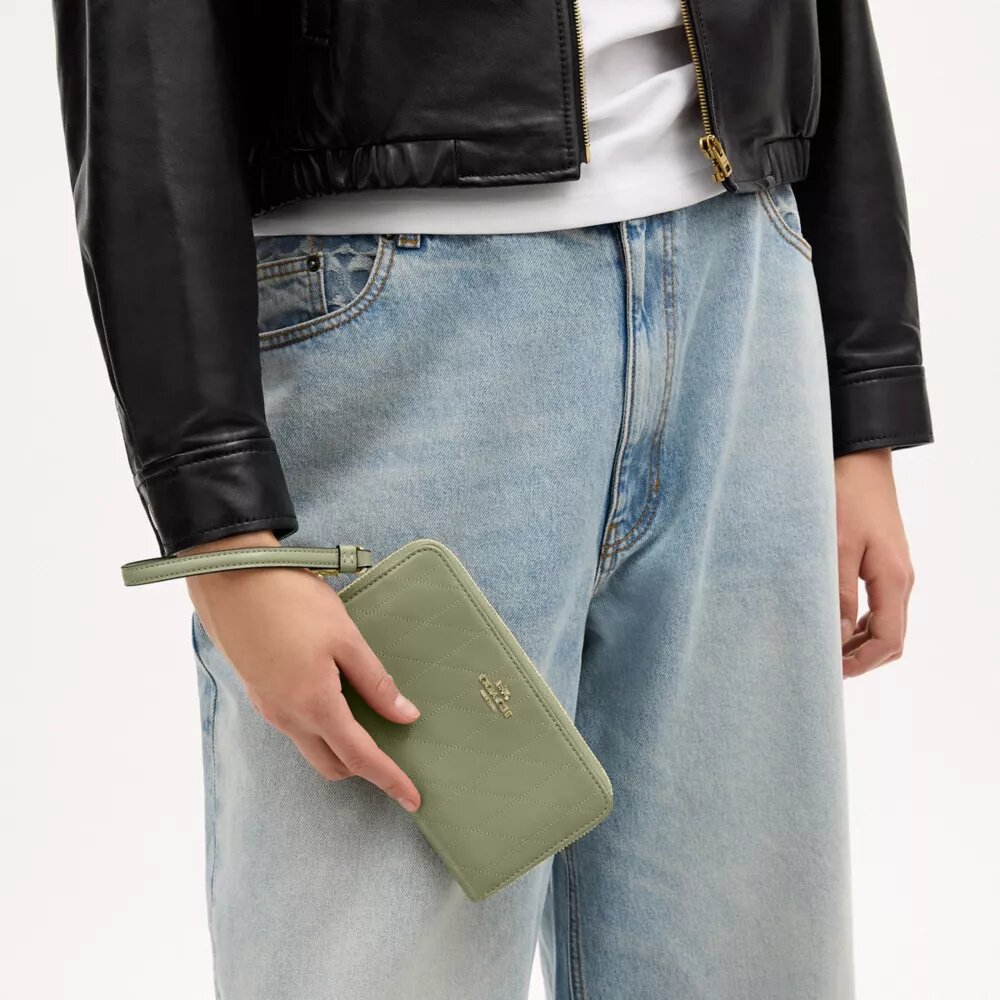 Cartera larga con cremallera y acolchado