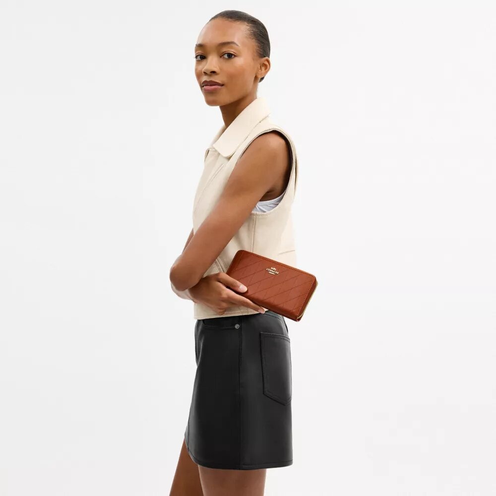 Cartera larga con cremallera y acolchado