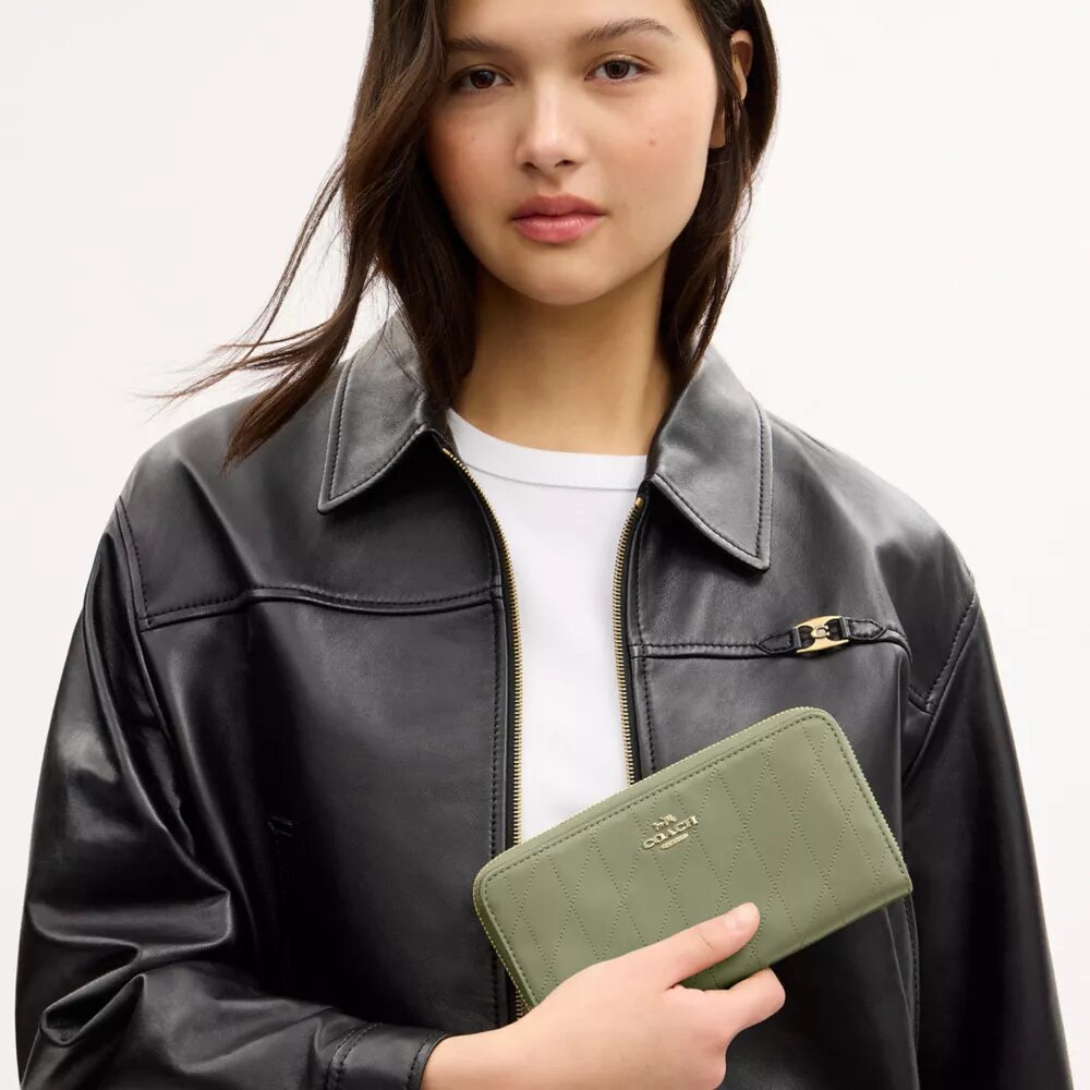 Cartera larga con cremallera y acolchado