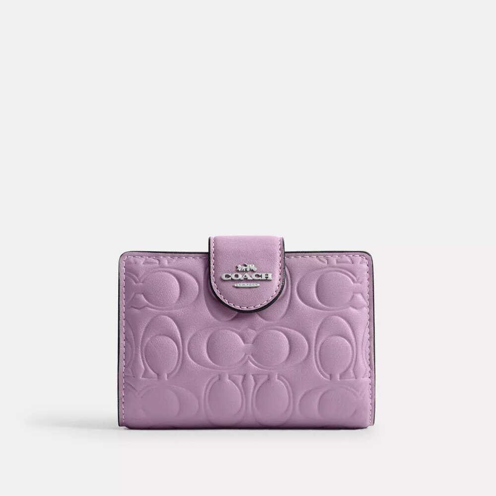 Cartera mediana con cremallera en esquina de piel exclusiva