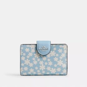 Cartera mediana con cremallera en esquina y estampado floral