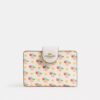 Cartera mediana con cremallera en esquina y estampado floral