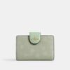 Cartera mediana con cremallera en esquina y estampado floral