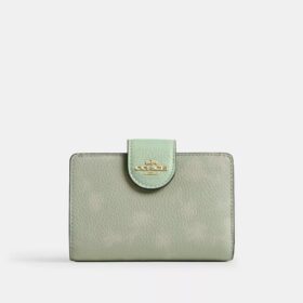 Cartera mediana con cremallera en esquina y estampado floral