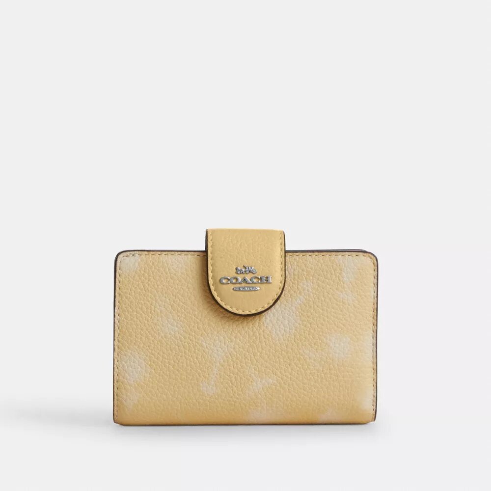 Cartera mediana con cremallera en esquina y estampado floral