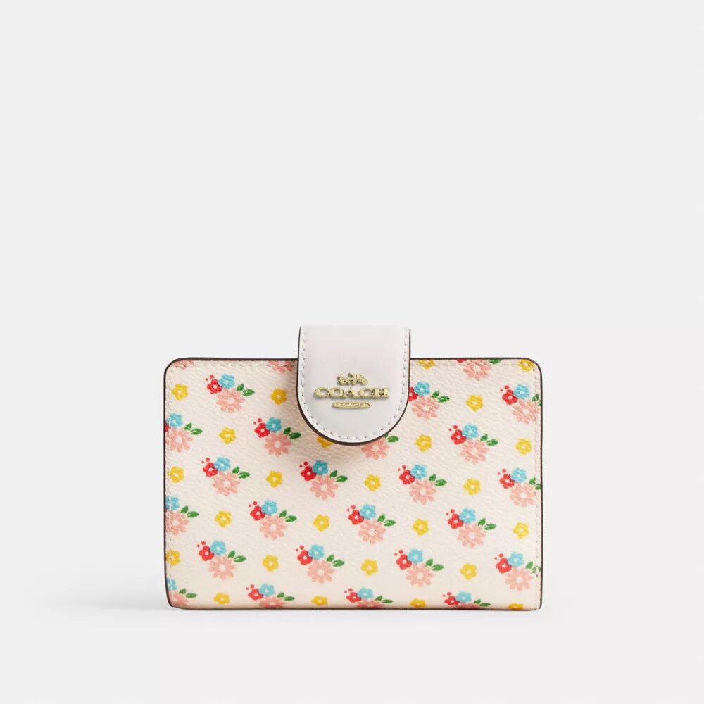 Cartera mediana con cremallera en esquina y estampado floral