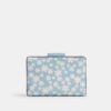Cartera mediana con cremallera en esquina y estampado floral