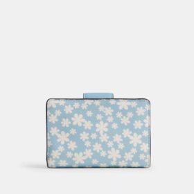 Cartera mediana con cremallera en esquina y estampado floral