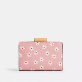 Cartera mediana con cremallera en esquina y estampado floral