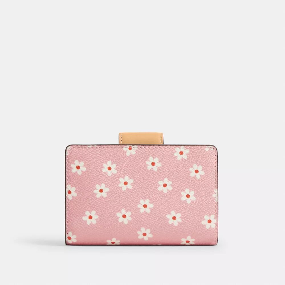 Cartera mediana con cremallera en esquina y estampado floral