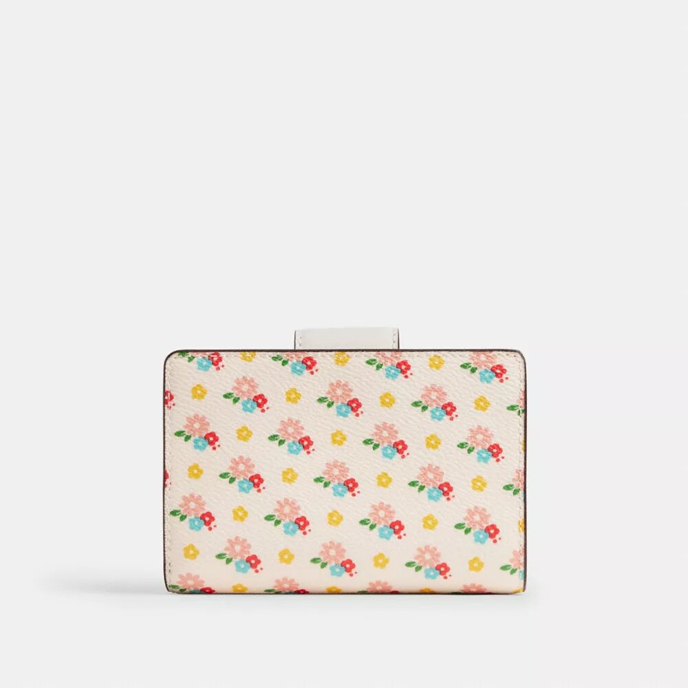 Cartera mediana con cremallera en esquina y estampado floral
