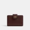 Cartera mediana con cremallera en la esquina