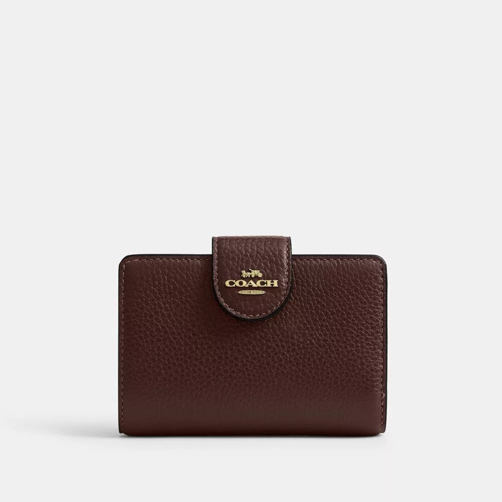 Cartera mediana con cremallera en la esquina