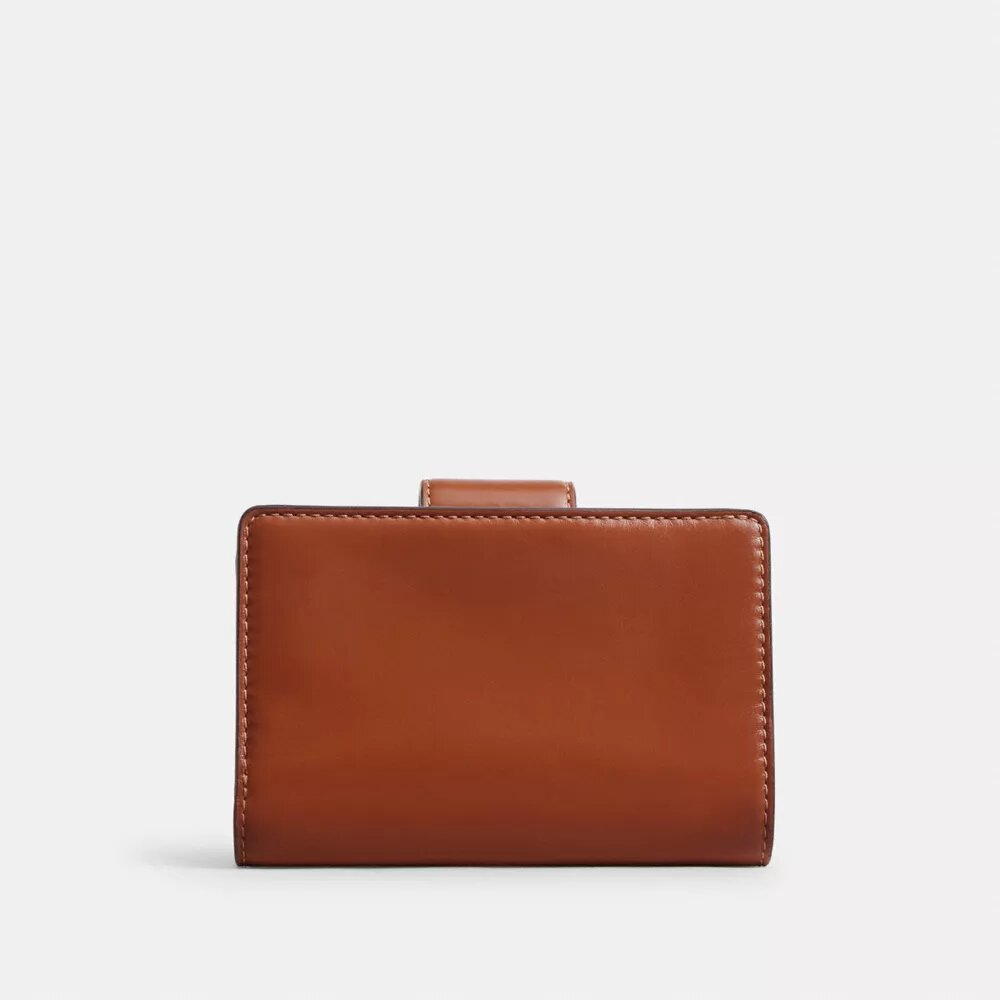 Cartera mediana con cremallera en la esquina