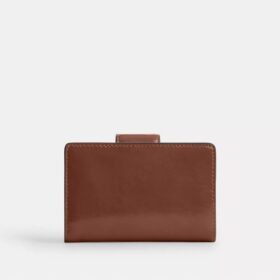 Cartera mediana con cremallera en la esquina